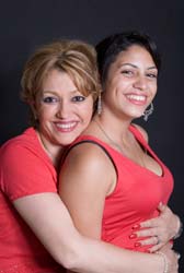 Mother hugging teenage daughter